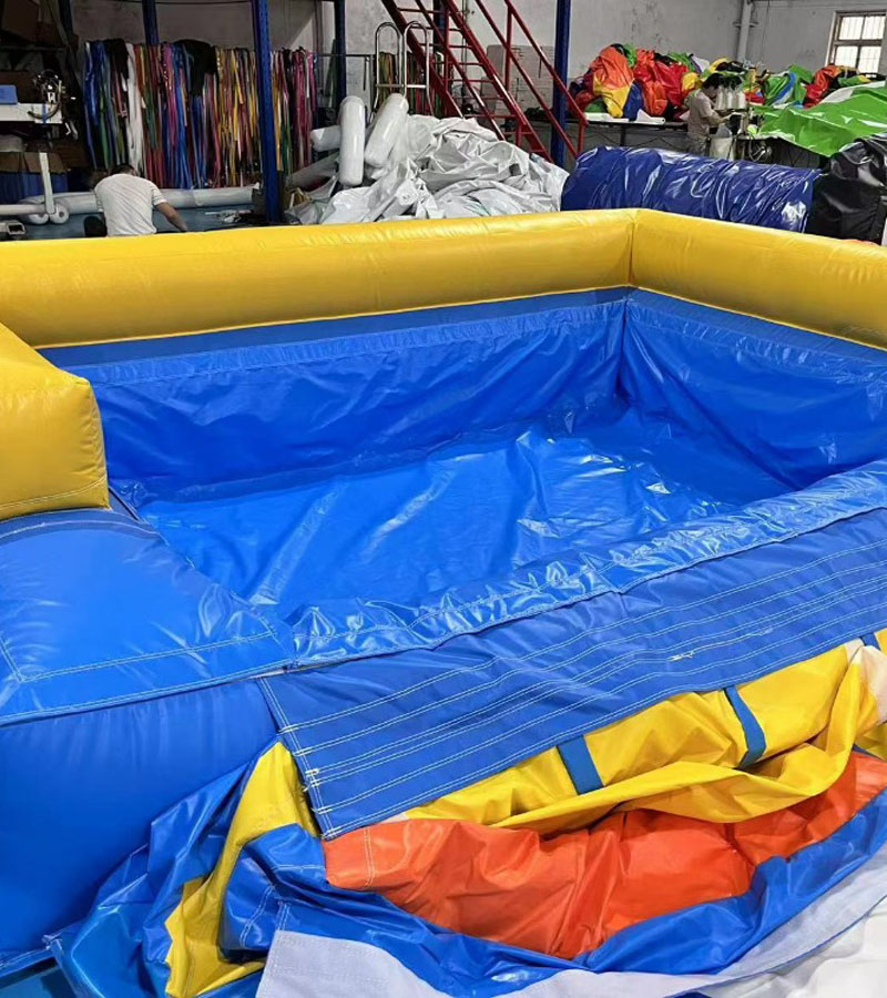 Der Spassmacher Hüpfburg Surfriesenrutsche plus Pool